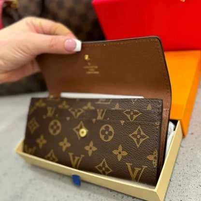 Share Authentic Louis Vuitton Portefeuille Sarah Monogram Long Wallet – Brown