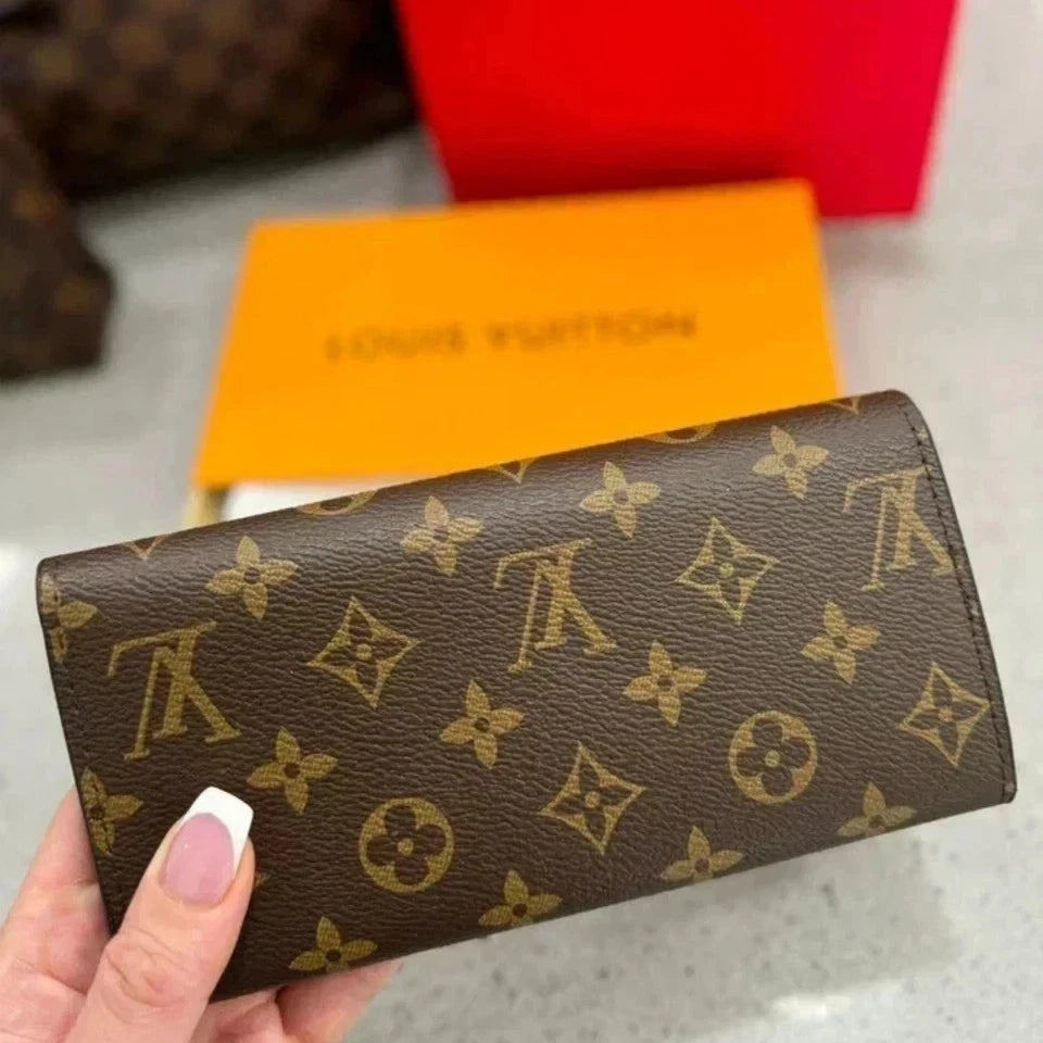 Share Authentic Louis Vuitton Portefeuille Sarah Monogram Long Wallet – Brown