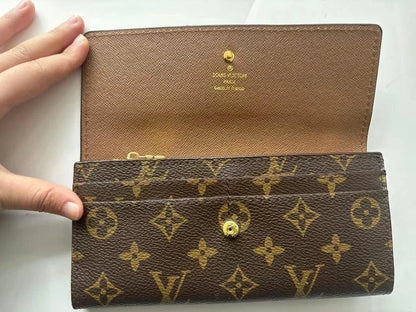 Share Authentic Louis Vuitton Portefeuille Sarah Monogram Long Wallet – Brown